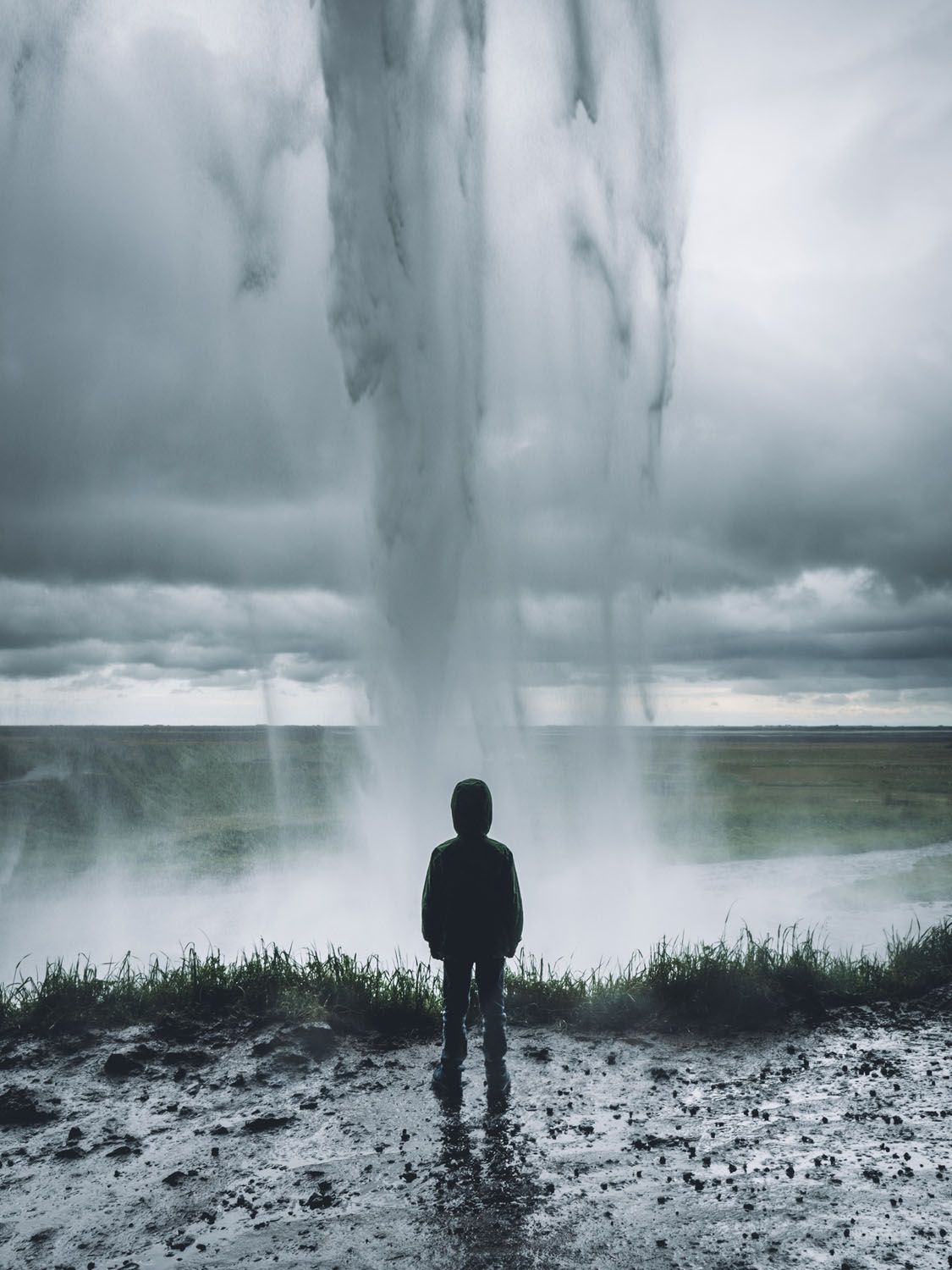 Boy Behind A Waterfall